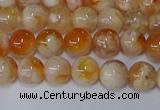 CAA1071 15.5 inches 6mm round sakura agate gemstone beads