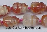 CAA1183 15.5 inches 15*20mm carved calabash sakura agate beads