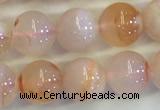 CAA3643 15.5 inches 6mm round sakura agate beads wholesale