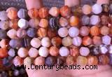 CAA3763 15.5 inches 10mm faceted nuggets mixed botswana agate beads