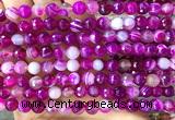 CAA6325 15 inches 6mm faceted round fuchsia banded agate beads