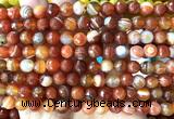 CAA6330 15 inches 6mm faceted round red banded agate beads