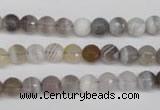 CAG1752 15.5 inches 6mm faceted round Chinese botswana agate beads