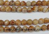 CAG1885 15.5 inches 6mm faceted round lemon crazy lace agate beads