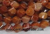 CAG582 15.5 inches 10*14mm faceted & twisted rice natural fire agate beads