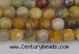 CAG9868 15.5 inches 4mm faceted round yellow crazy lace agate beads