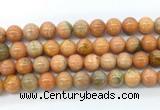 CCA554 15.5 inches 12mm round peach calcite gemstone beads