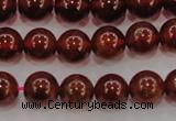 CGA602 15.5 inches 8mm A grade round natural orange garnet beads
