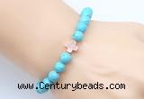 CGB9352 8mm, 10mm blue howlite & cross hematite power beads bracelets