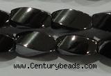 CHE161 15.5 inches 6*12mm twisted rice hematite beads