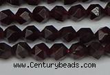 CNG7275 15.5 inches 6mm faceted nuggets red garnet beads