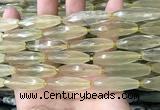 CRI132 15.5 inches 10*30mm faceted rice lemon quartz beads