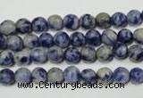 CRO771 15.5 inches 6mm faceted round blue spot stone beads wholesale