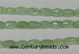 CRU165 15.5 inches 5*8mm faceted rice green rutilated quartz beads