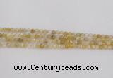 CRU666 15.5 inches 4mm faceted round golden rutilated quartz beads