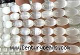 CSE636 15 inches 10*14mm rice selenite beads wholesale