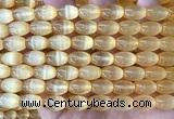 CSE735 15 inches 8*12mm rice selenite beads wholesale