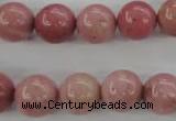 CWF14 15.5 inches 10mm round pink wooden fossil jasper beads