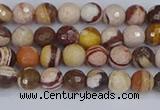 CZJ278 15.5 inches 4mm faceted round zebra jasper beads