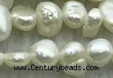 FWP234 14.5 inches 3mm - 4mm baroque white freshwater pearl strands