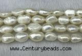 FWP304 15 inches 11mm - 12mm baroque white freshwater pearl strands