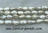 FWP353 15 inches 9mm - 10mm baroque white freshwater pearl strands